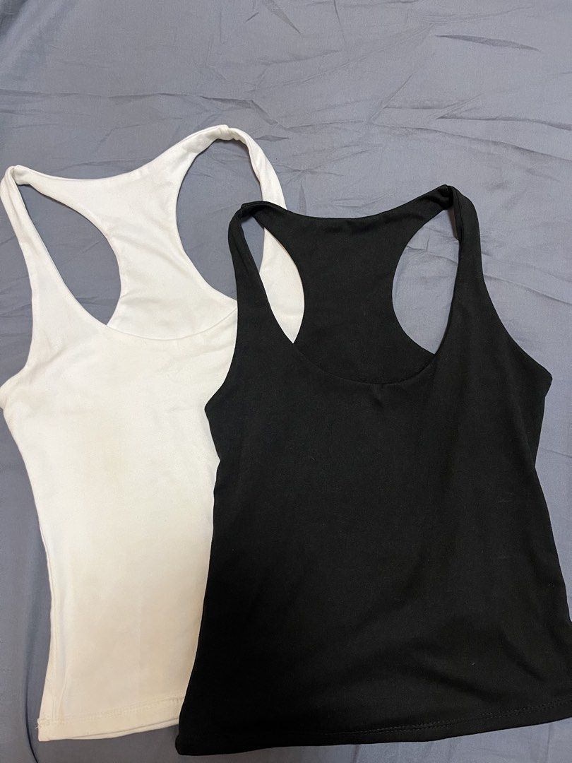 2x Racerback Tank Tops - Black & White (Category: Sleeveless) located in Manila. Submitted by withluvbee (Listing ID 1462209498, Image 2). Description: 2pc racerback tank tops. Black and white. Michi brand. Both never worn..