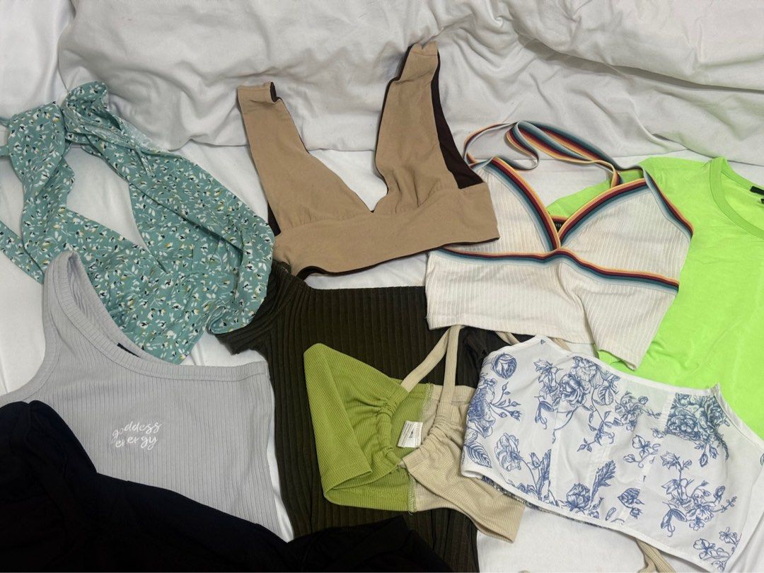 30 EACH, GET ALL 9 TOPS FOR 200 (Category: Others Tops) located in Taguig. Submitted by lovedbynicx (Listing ID 1462136485, Image 1). Description: - White ribbed crop top with rainbow stripes - Grey one-shoulder top with 'goddess energy' embroidery - Green ribbed halter top - Blue floral halter top - White toile print bustier top - Ideal for creating various summer outfits.