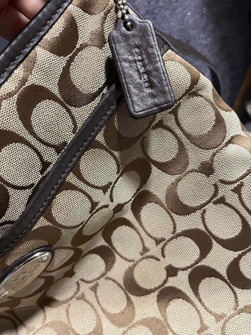 👜 AUTHENTIC COACH BAG — FOR SALE (Category: Cross-body Bags) located in Caloocan City. Submitted by trebdy01 (Listing ID 1462078753, Image 3). Description: 👜 AUTHENTIC COACH BAG — FOR SALE Lightly Used | Good Overall Condition Authentic Coach bag, lightly used and still very nice overall. 🤎 ⚠️ PLEASE READ: One portion of the bag was damaged by a mouse. The damaged area was sewn repaired, as shown clearly in the photos. I’m selling it because I