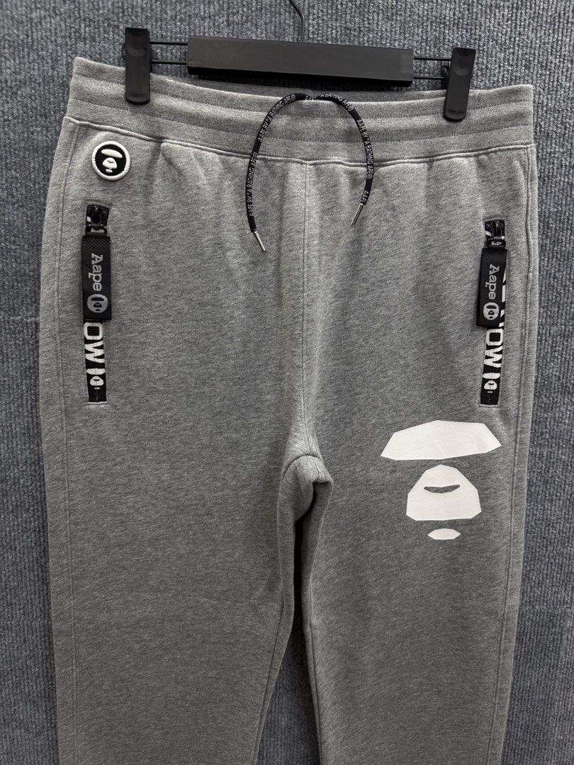 A Bathing Ape BAPE Grey Ape Head Sweatpants (Category: Activewear) located in Marikina City. Submitted by grindmanila (Listing ID 1462108726, Image 2). Description: MENS MED - LARGE FITS✔️ MEDIUM TAG 30 - 34 WAISTLINE 38 LENGTH GOOD AS BRANDNEW✅.