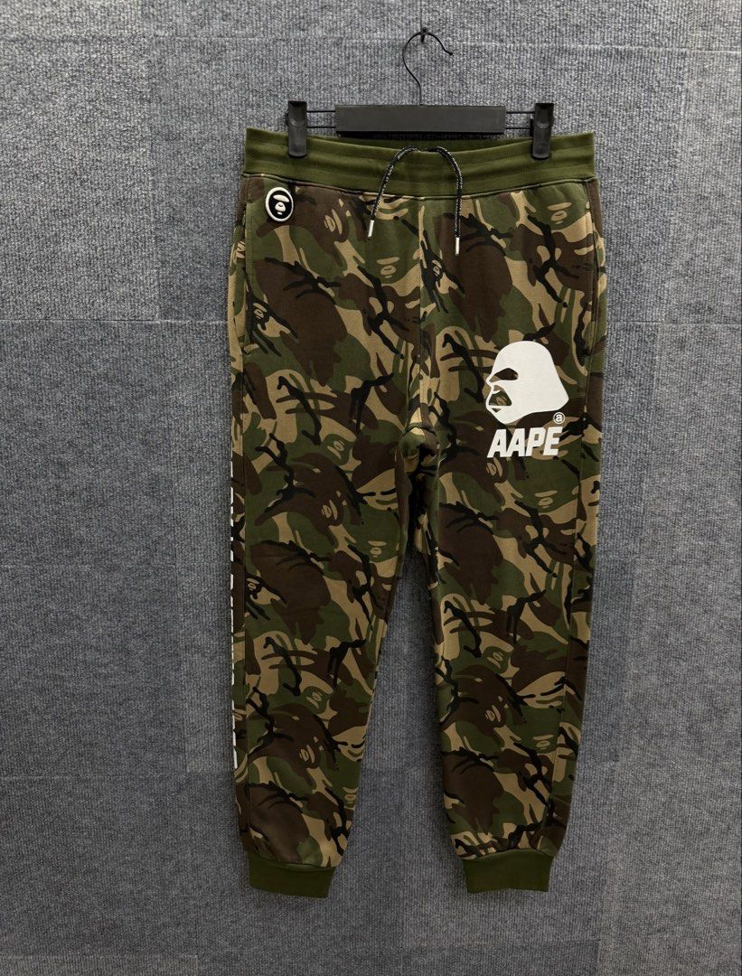 AAPE by A Bathing Ape Camo Jogger Pants (Category: Activewear) located in Marikina City. Submitted by grindmanila (Listing ID 1462108322, Image 1). Description: MENS MED - LARGE FITS✔️ MEDIUM TAG 30 - 34 WAISTLINE 38 LENGTH GOOD AS BRANDNEW✅.