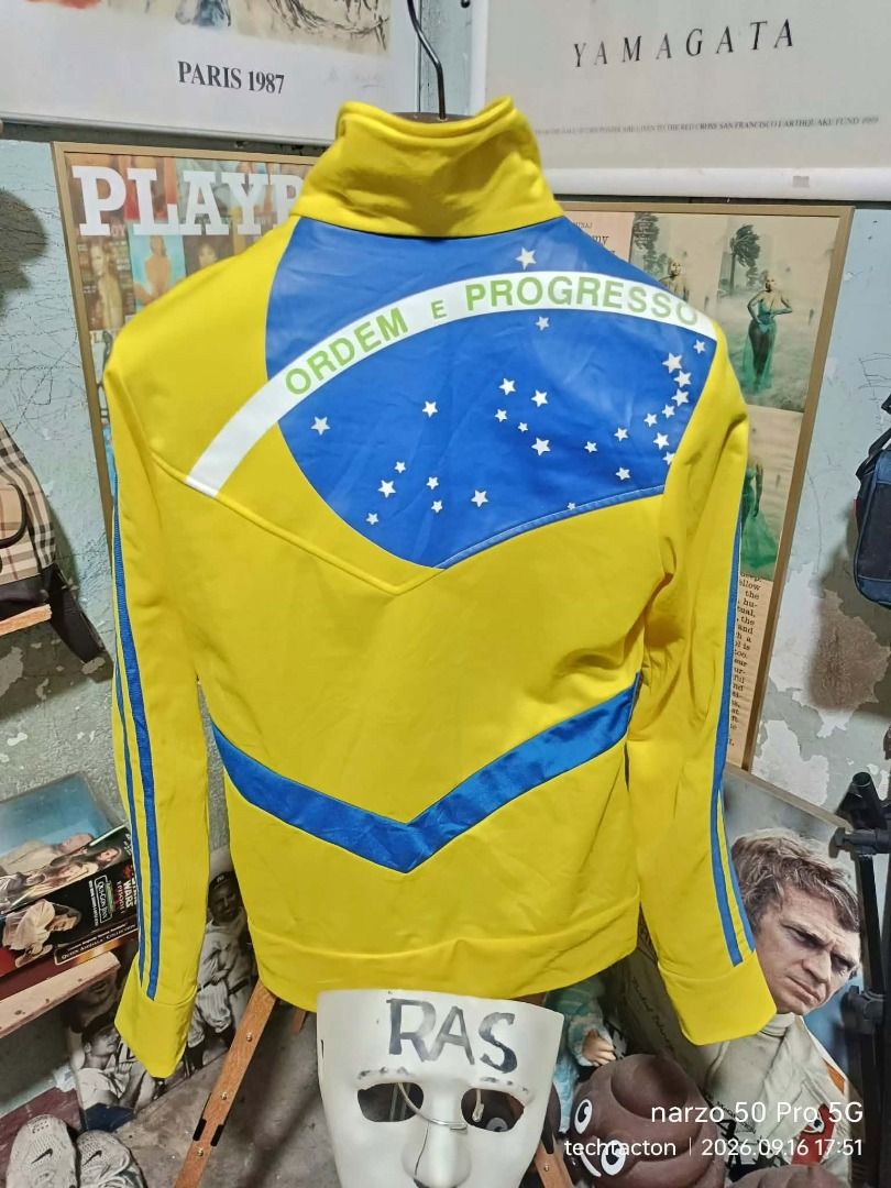 Adidas Brasil Track Jacket Yellow Blue (Category: Coats, Jackets and Outerwear) located in Santo Tomas. Submitted by pickers_corner (Listing ID 1462182380, Image 2). Description: ADIDAS Brazil womens Track jacket size 85 dime 17.5x23.5 very good condition no holes no stain issue minimal sign of used or molmol - Yellow Adidas track jacket - Blue accents - Brasil flag design on back with 'Ordem e Progresso' - Zip-up front with Adidas logo zipper pu
