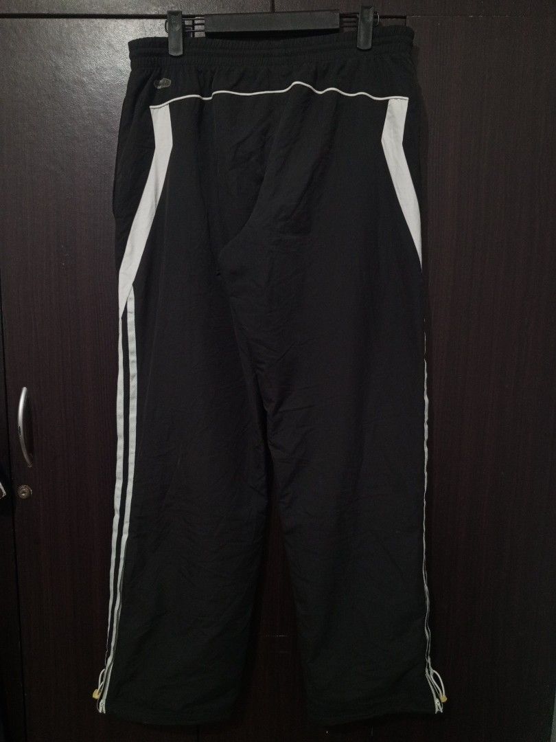 Adidas Stripe trackpants (Category: Activewear) located in Santa Maria. Submitted by paulo-garcia21 (Listing ID 1462130750, Image 2). Description: large on tag 30 to 36 by 40 hem 8.8 L.O 12 inseam 29.5 issue on the last pic.