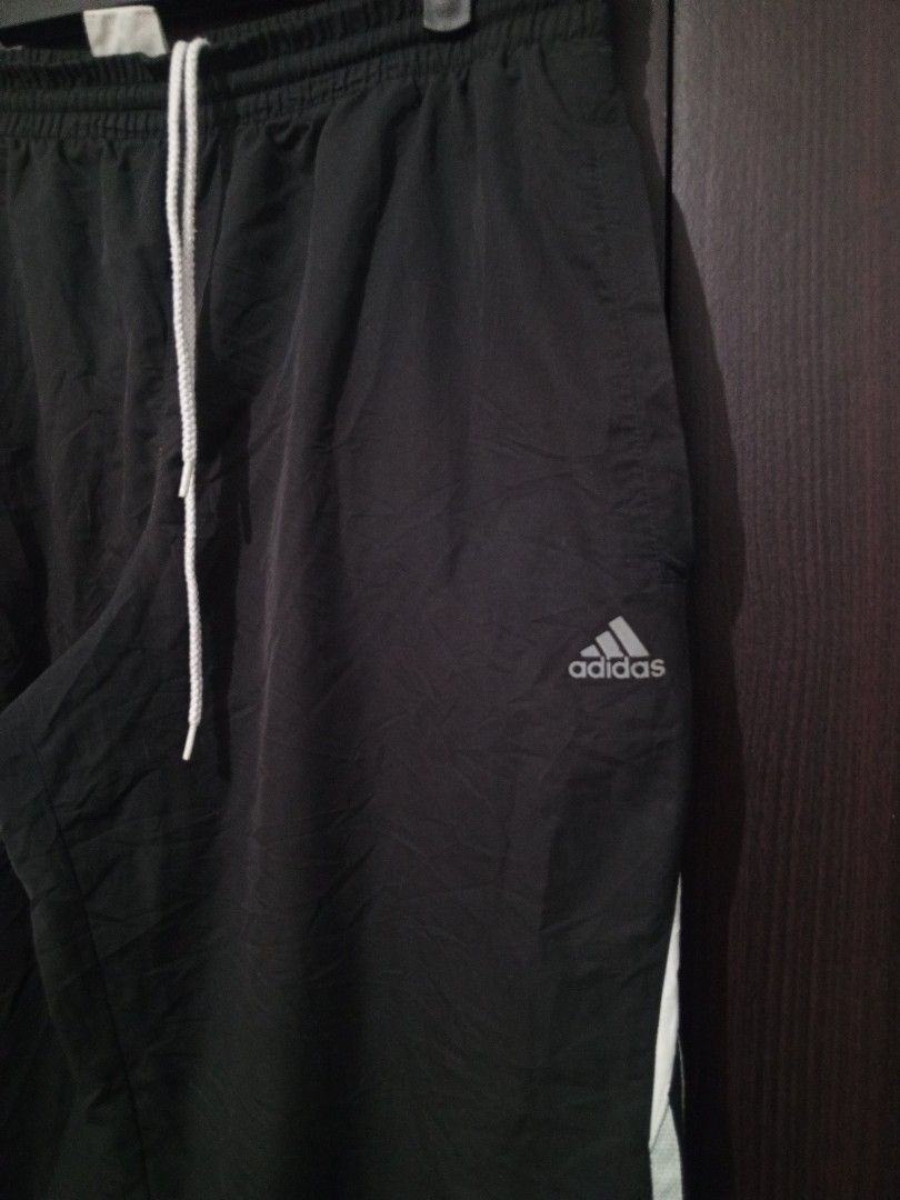 Adidas Stripe trackpants (Category: Activewear) located in Santa Maria. Submitted by paulo-garcia21 (Listing ID 1462130750, Image 3). Description: large on tag 30 to 36 by 40 hem 8.8 L.O 12 inseam 29.5 issue on the last pic.