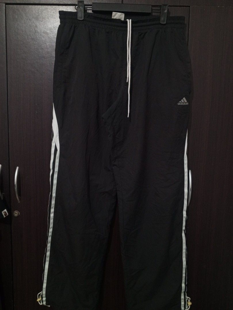 Adidas Stripe trackpants (Category: Activewear) located in Santa Maria. Submitted by paulo-garcia21 (Listing ID 1462130750, Image 1). Description: large on tag 30 to 36 by 40 hem 8.8 L.O 12 inseam 29.5 issue on the last pic.