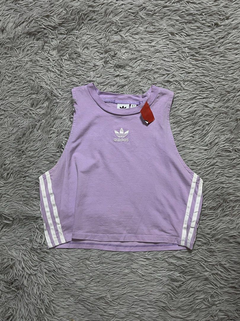 Adidas Tank Top (Category: Activewear) located in Dipolog. Submitted by krstnagnis98 (Listing ID 1462037086, Image 1). Description: Adidas Tank Top Med Like new Authentic .