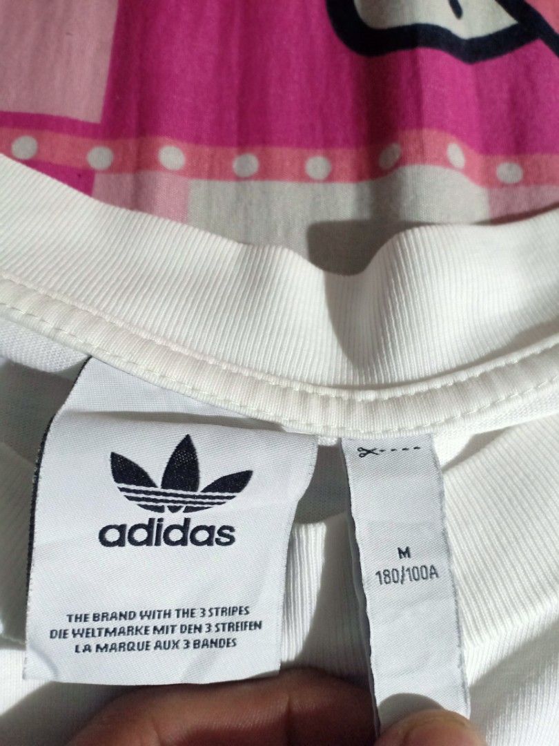 Adidas White Tees (Category: Tshirts & Polo Shirts ) located in Pasig City. Submitted by thrifttofit (Listing ID 1462189263, Image 3). Description: Adidas Size M fit Large Color rate 10/10 Condition 10/10 L-27 W-25 No issue Pasig city📍.