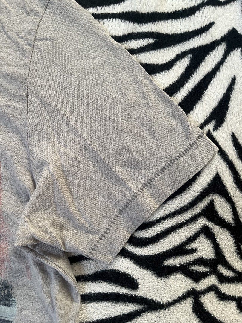 Aeropostale graphic t-shirt (Category: Tshirts & Polo Shirts ) located in Santo Tomas. Submitted by venpineda (Listing ID 1462123406, Image 3). Description: This appears to be a grey Aeropostale graphic t-shirt featuring a faded New York City skyline print with the Chrysler Building and bold “NYC” lettering. single stitching size Xs Length 26 width 17.