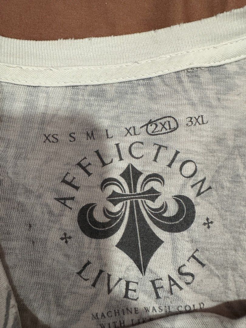 Affliction Grail (Category: Tshirts & Polo Shirts ) located in Pasay City. Submitted by xansells (Listing ID 1462184677, Image 3). Description: 22x31.