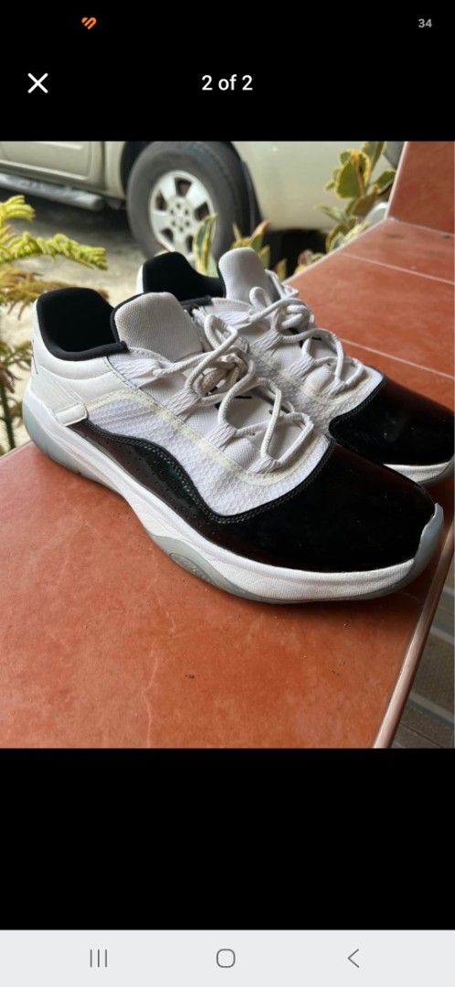 Air Jordan 11 Low White Black CMFt (Category: Sneakers) located in Iloilo. Submitted by franzventures (Listing ID 1462164793, Image 2). Description: - Authentic Air Jordan 11 Lows - Classic white mesh upper - Black patent leather toe box - Clean white laces - Translucent soles - Overall good, pre-loved condition.