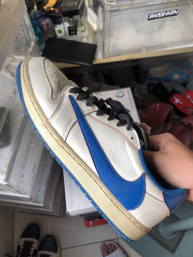 Air Jordan 1 Low Travis Scott (Category: Sneakers) located in Manila. Submitted by tan.alejandro.aragon.p (Listing ID 1462120508, Image 3). Description: - Travis Scott Jordan 1 Lows - White leather with blue swoosh and accents - Comes with original box - Includes pink and black laces.
