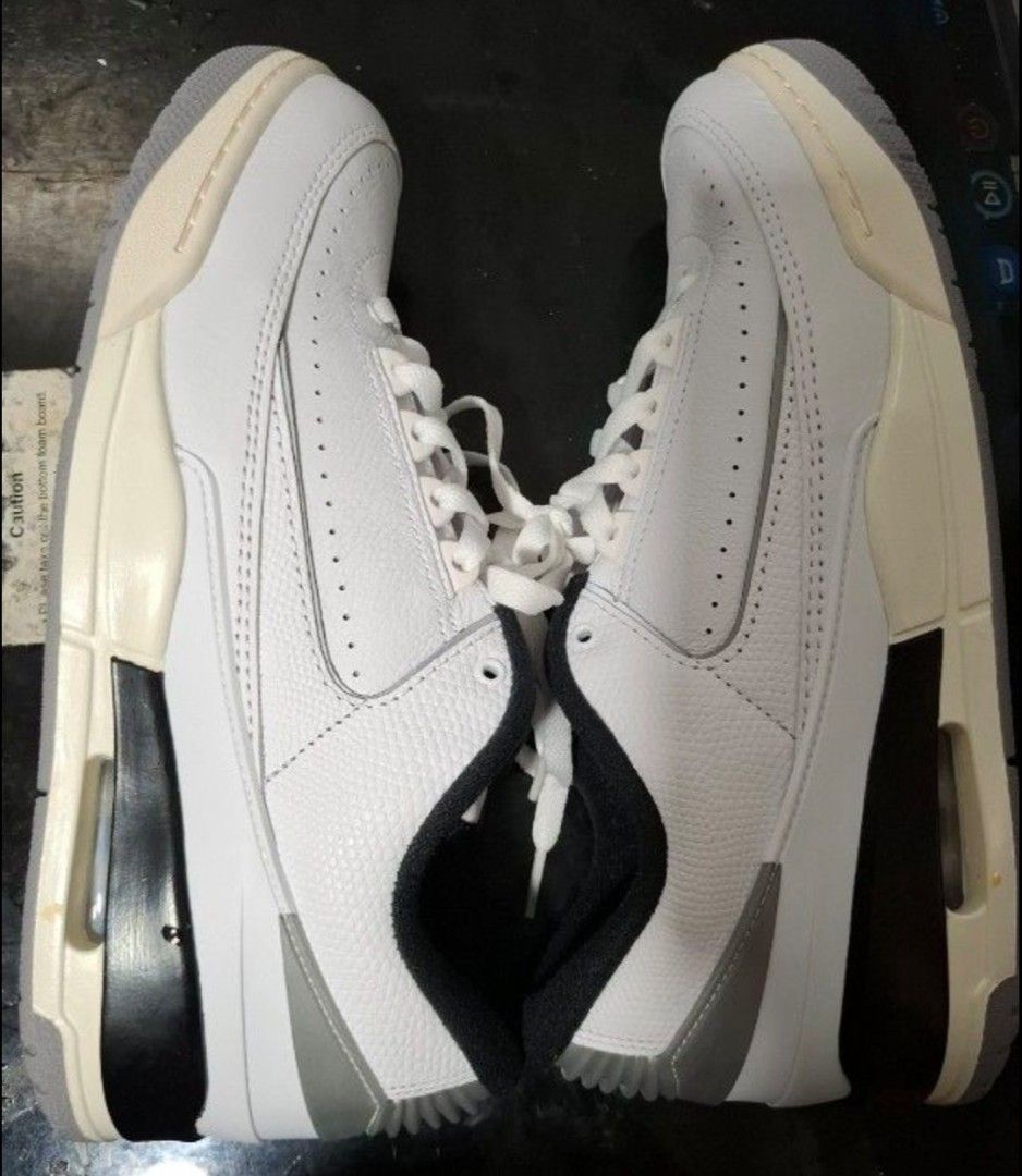 Air Jordan 2/3 colab Low White Cement Grey (Category: Sneakers) located in Makati City. Submitted by tabsilog (Listing ID 1462072343, Image 1). Description: - Rare Air Jordan 2/3 colab Low - White leather upper - Cement grey accents - Black and red interior details - White laces - Essential addition to any sneaker collection - 💯% Authentic and rare price neg.