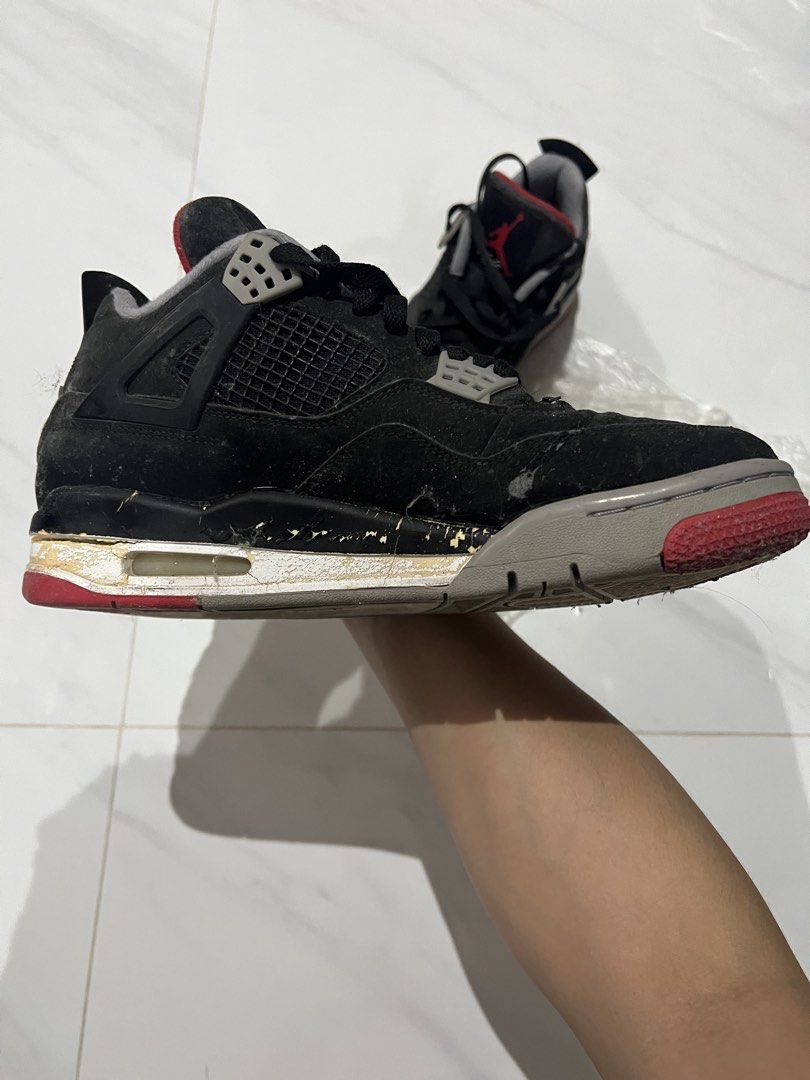 Air Jordan 4 Retro Black Red Cement (Category: Sneakers) located in Manila. Submitted by newfalcon.091f6a (Listing ID 1462120478, Image 3). Description: - Air Jordan 4 Retro sneakers - Color: Black with red and grey accents - Classic silhouette - Ideal for collectors or casual wear - Please check photos for detailed condition.
