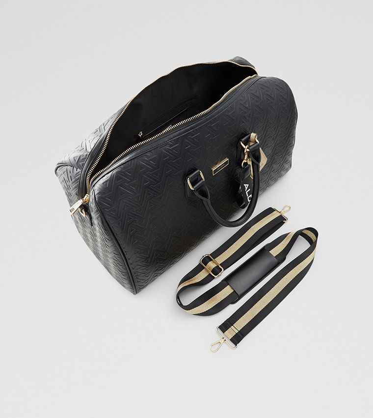 ALDO Limited Edition Black Embossed Duffle Bag with Strap (Category: Luxury Bags & Wallets) located in Manila. Submitted by maichandise (Listing ID 1462159378, Image 3). Description: - Brand: ALDO - Color: Black - Style: Duffle Bag - Features: All-over embossed pattern, gold hardware details - Includes: Detachable shoulder strap - Ideal for: Travel, weekend bag Original price : ₱8,000 Price is negotiable 🥰.