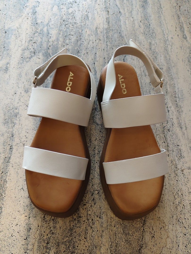 Aldo thilda wedge sz 7.5 (Category: Sandals) located in Mandaluyong City. Submitted by lovelabelsph (Listing ID 1462221717, Image 1). Description: Aldo thilda white platform sandals Php1,500 Price is firm Free shipping Size US 7.5 Measurements: Insole length 9.5" Insole width 3.25" Heel 2.25" Never used, good as new Shows slight signs of being tried on No more box (will ship with replacement box) Mop Gcash, BPI or BDO More items at IG lovelabelsp