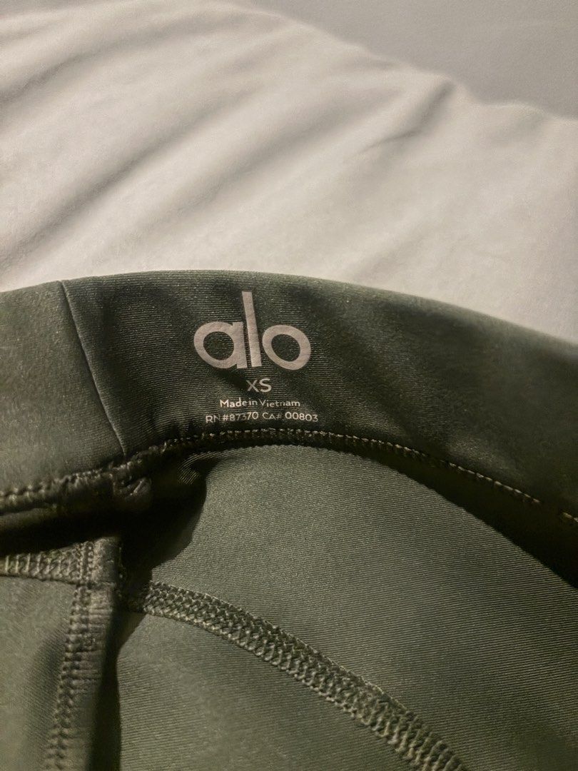 Alo dark green leggings (Category: Activewear) located in Quezon City. Submitted by shopsoph (Listing ID 1462150912, Image 2). Description: super cute color but too small for me.