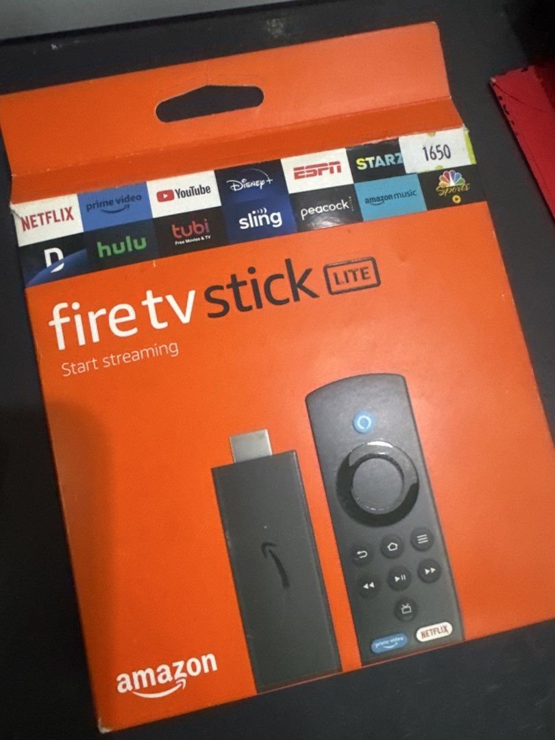 Amazon Fire Stick Lite (Category: Entertainment Systems & Smart Home Devices) located in Makati City. Submitted by charmedfactory (Listing ID 1462123033, Image 1). Description: Opened the box to try the device.