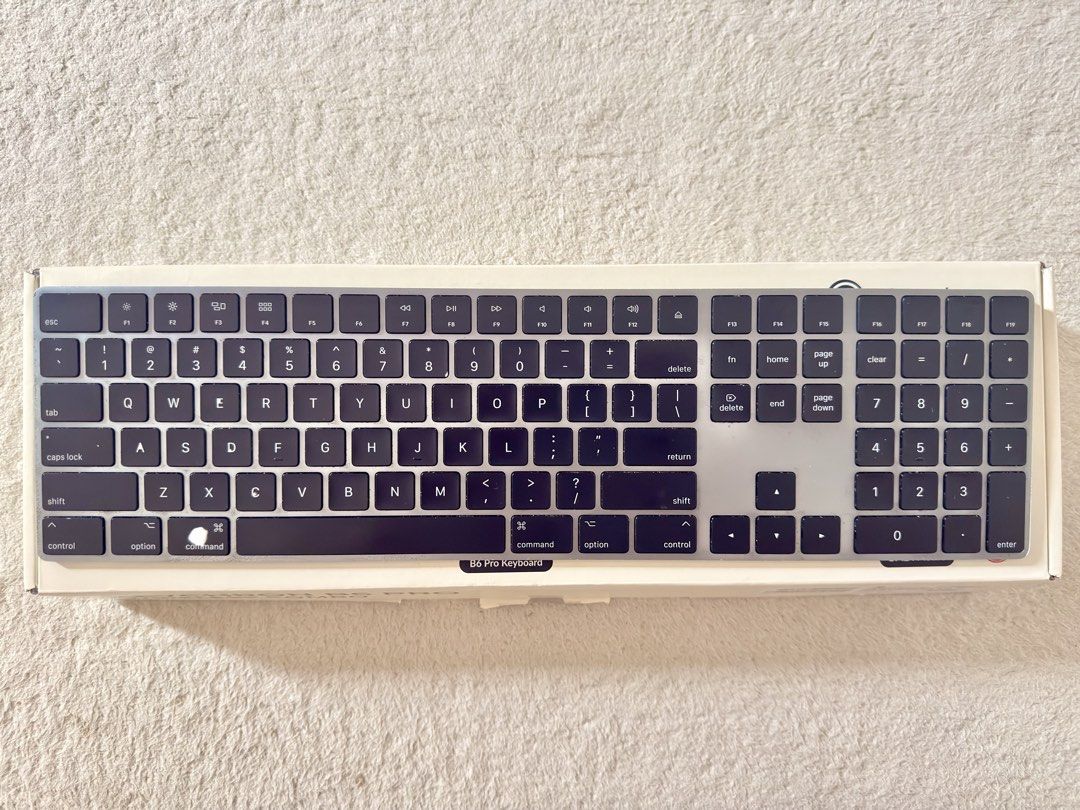 Apple Magic Keyboard with Numeric Keypad (Category: Chargers) located in Cainta. Submitted by kidlat08 (Listing ID 1460334156, Image 2). Description: 🍎 MAC USERS, THIS ONE’S FOR YOU! 🔥 Apple Magic Keyboard with Numeric Keypad — A1843 ⌨️ Premium Apple keyboard at only ₱2,999! 🔋 Long battery life ⚡ Rechargeable via Lightning cable 🔢 Full-size keyboard with Numeric Keypad ✅ No issues — fully working (cosmetic wear on the command key) 📦 No box �
