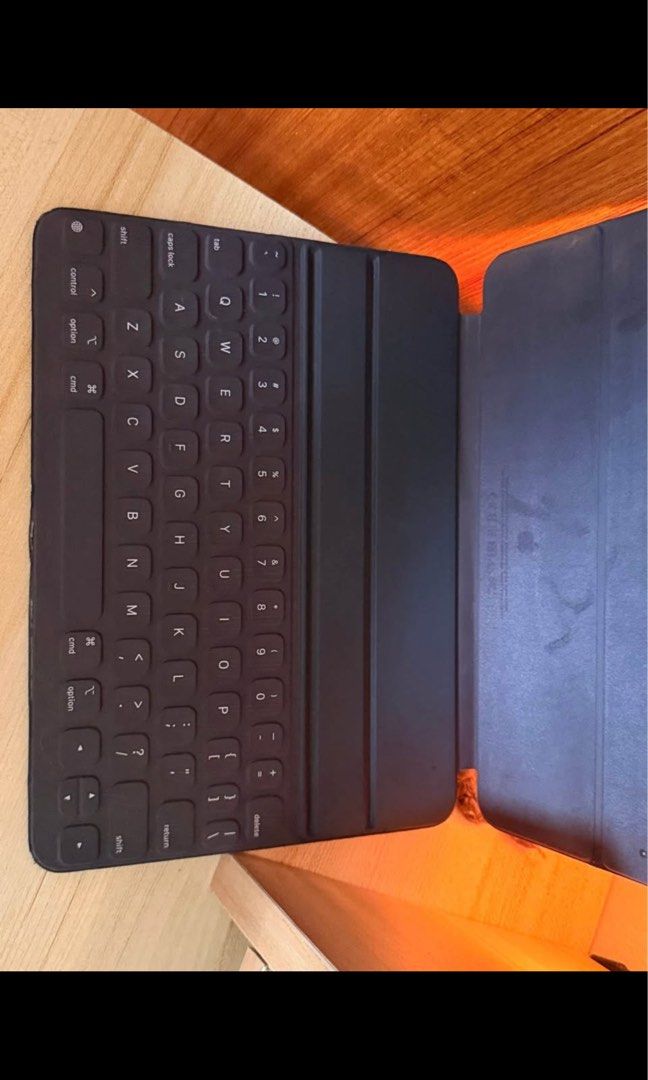 Apple Smart Keyboard Folio for iPad Pro and Air (Category: Cases & Sleeves) located in Dasmarinas. Submitted by smsebtian (Listing ID 1462073567, Image 3). Description: Selling my Apple Smart Keyboard for P1,300 Magnetic; attaches to three magnetic contacts (no charging or pairing required) Expect signs of usage. Compatible for iPad Pro 11” 1st, 2nd and 3rd Gen, iPad Air 4th and 5th gen. Rfs: Extra Keyboard.