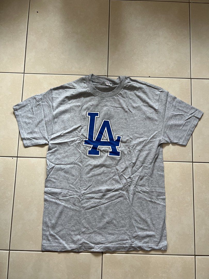 All Style Apparel T-Shirt (Category: Tshirts & Polo Shirts ) located in Mandaluyong City. Submitted by luna_elisse (Listing ID 1462074378, Image 1). Description: - Grey T-Shirt - Features LA Dodgers Logo - Brand: Arizona Jeans Co. - Made in the USA - Size: L/G - Comfortable casual wear - Ideal for Dodgers fans -Price:350+sf -MOP: Gcash/BDO/GoTyme -Location: Mandaluyong -RFS: gift/decluttering.