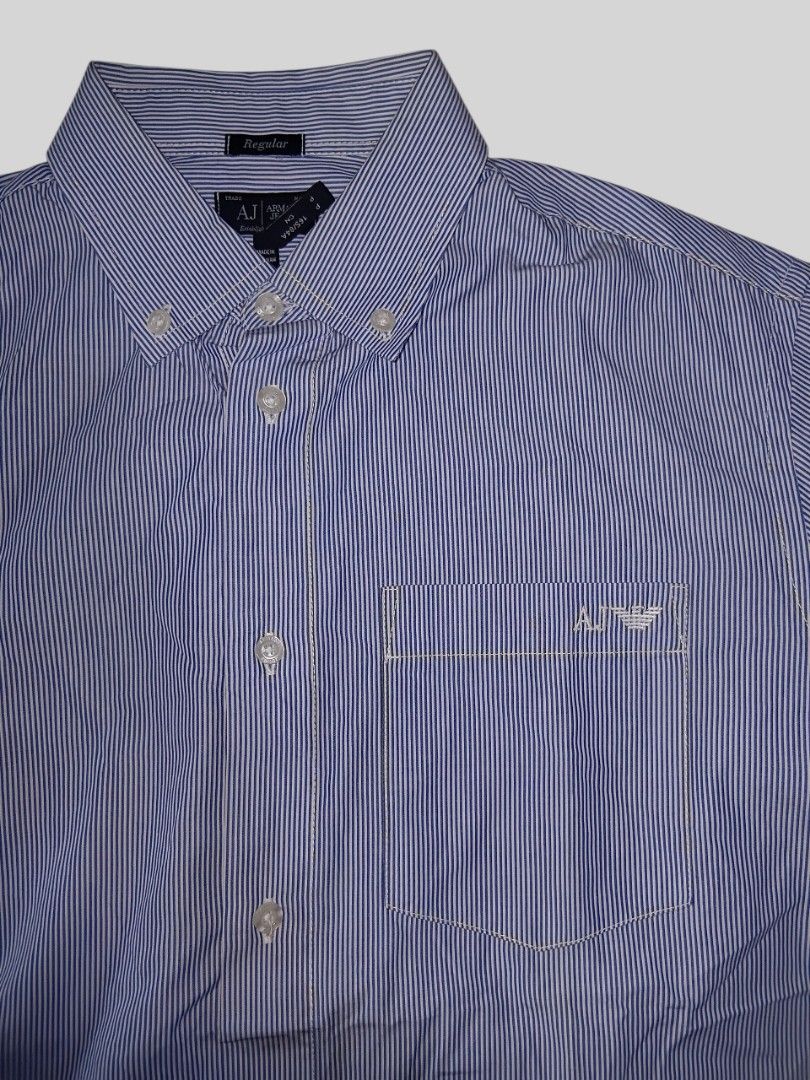 Armani jeans (Category: Formal Shirts) located in Malasiqui. Submitted by v.hype (Listing ID 1462045448, Image 2). Description: Armani jeans size: small on tag fit to large dimension: 22w 26.5L excellent condition no issue price : 800 pesos + ship.