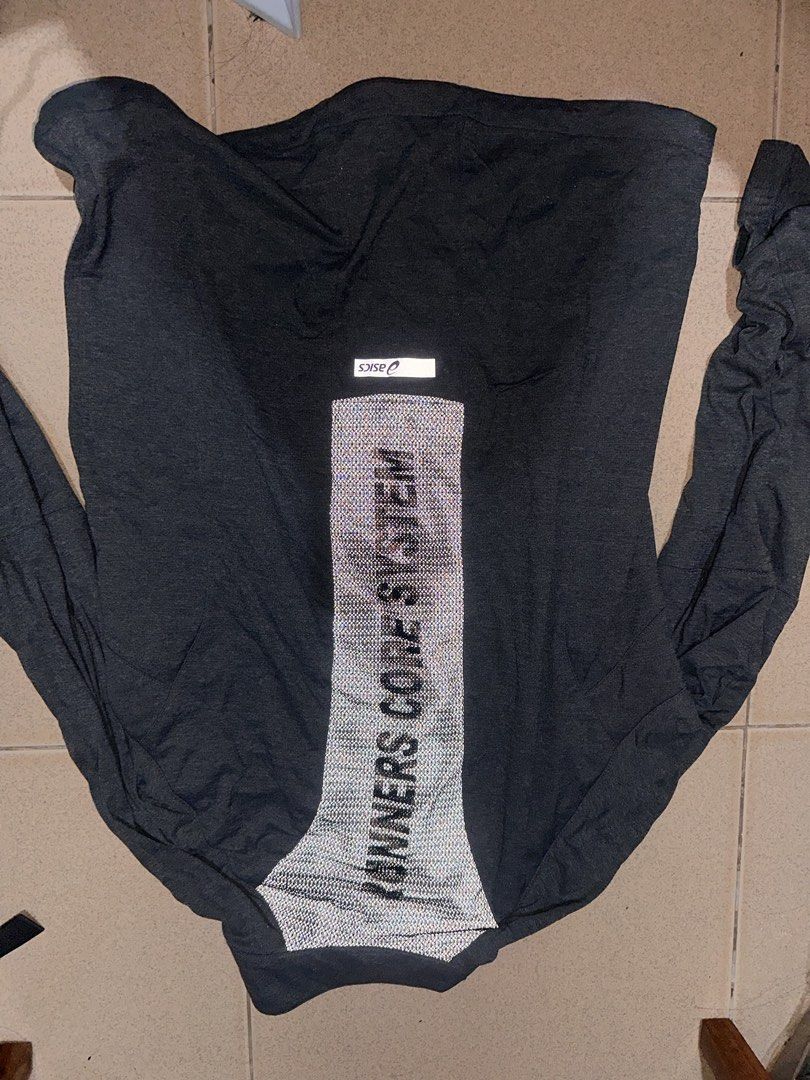 Asics Runners Core System Jacket (Category: Coats, Jackets and Outerwear) located in Manila. Submitted by mysticfox_80d6c7 (Listing ID 1462134349, Image 2). Description: - Grey Asics jacket - Neon green zipper - Reflective details on front and back - Zippered pockets for secure storage - Ideal for running and workouts - 'Runners Core System' graphic on the back.