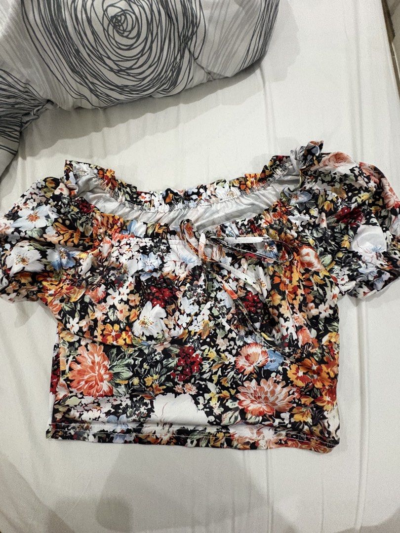 Assorted Crop Tops - Floral, Striped, Graphic, Ribbed (Category: Others Tops) located in Cainta. Submitted by emmagirl29 (Listing ID 1462188706, Image 2). Description: Take ALL for ₱250 or pm offer 12 Assorted tops. Mostly crop tops. Some used 1x, some fitted and stored only. Fits small-large I’m usually a small-med frame but i usually upsize because my torso is long so i choose a size bigger to have a longer length. No body odor!‼️ Pls manage ex