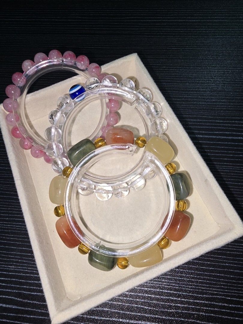 Assorted Gemstone and Crystal Beaded Bracelets (Category: Bracelets) located in Santa Rosa. Submitted by crystal1.0 (Listing ID 1462121438, Image 1). Description: 1. Rhodonite 2. Clear Quartz with evil eye charm 3. Free Form Agate (colorful) 16cm..