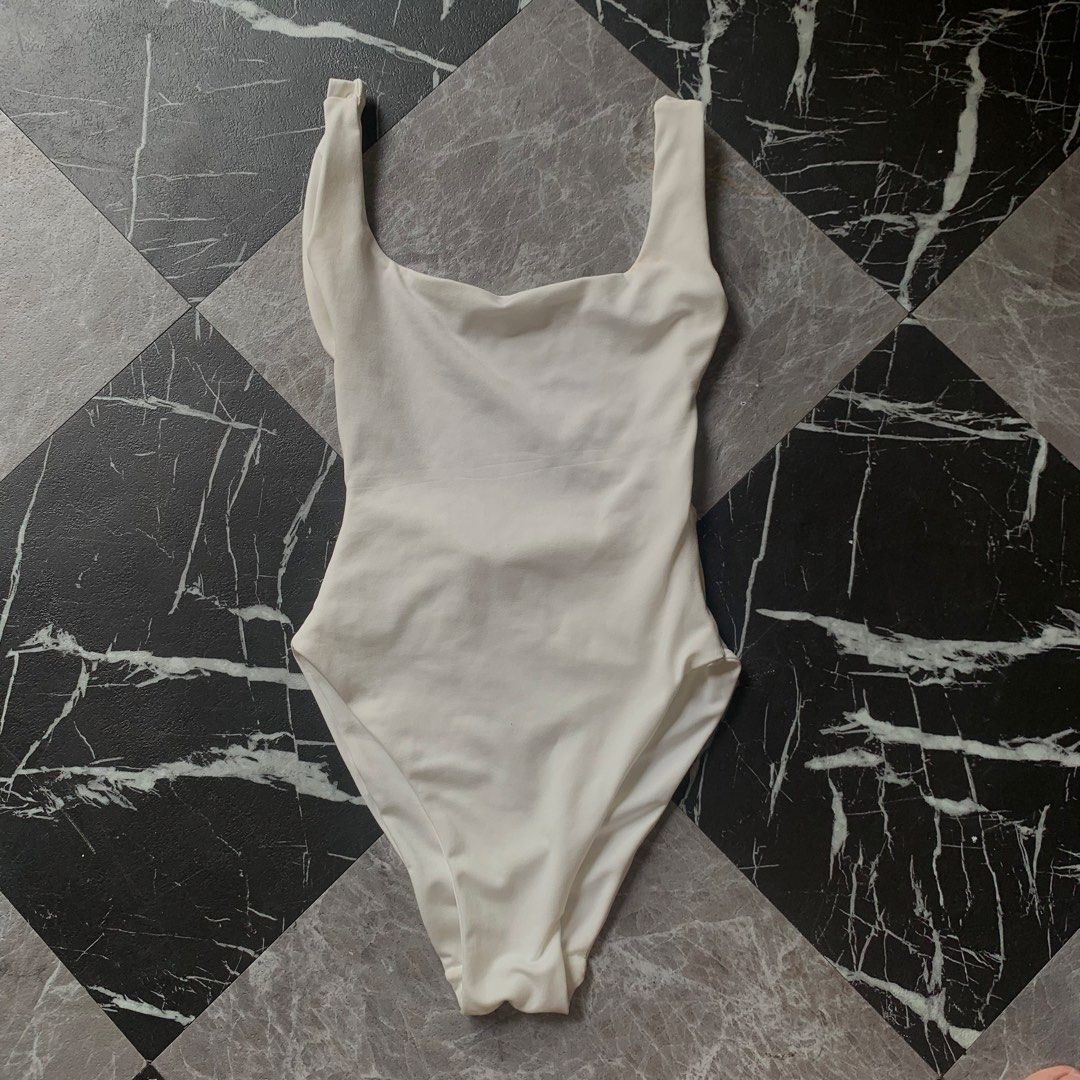 Assorted top / bikini (Category: Bikinis & Swimsuits) located in Santa Rosa. Submitted by kizzydoll-200611 (Listing ID 1462150071, Image 1). Description: white bodysuit - xs-s - backless black bodysuit - med - backless - shein blue tube top - xs to s hot pink swimsuit - not padded - small to med blue swimsuit - padded - small tennis skirt - 23 to 24.