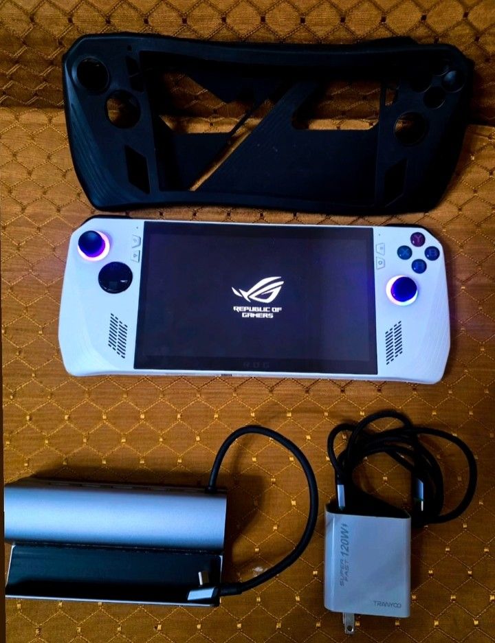 ASUS ROG Ally Gaming Handheld Console with Accessories (Category: Others) located in Manila. Submitted by ezekislacl02490 (Listing ID 1462083617, Image 1). Description: - ASUS ROG Ally (White) - Protective Case Included - 120W Fast Charger - Power Bank and Cable - Excellent for portable gaming.