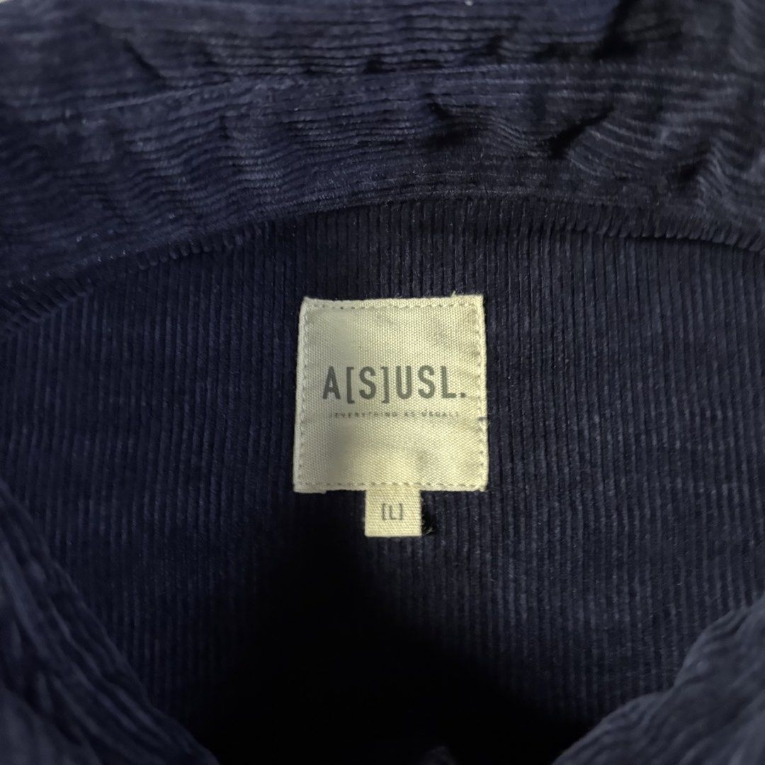 ASUSL JP Multipocket Corduroy Button-down Longsleeves in Blue (Category: Coats, Jackets and Outerwear) located in Manila. Submitted by yama_archive (Listing ID 1462190350, Image 3). Description: ASUSL JP Multipocket Corduroy Button-down Longsleeves in Blue Dimes (inches starting from 0) — - Size on tag: L (can fit up to XXL) - Width: 26.5 - Length: 31 front / 34.5 back - Shoulders: 26 - Sleeves: 23 - Fabric: Corduroy cotton ₱1500 Issues: ❌ Condit