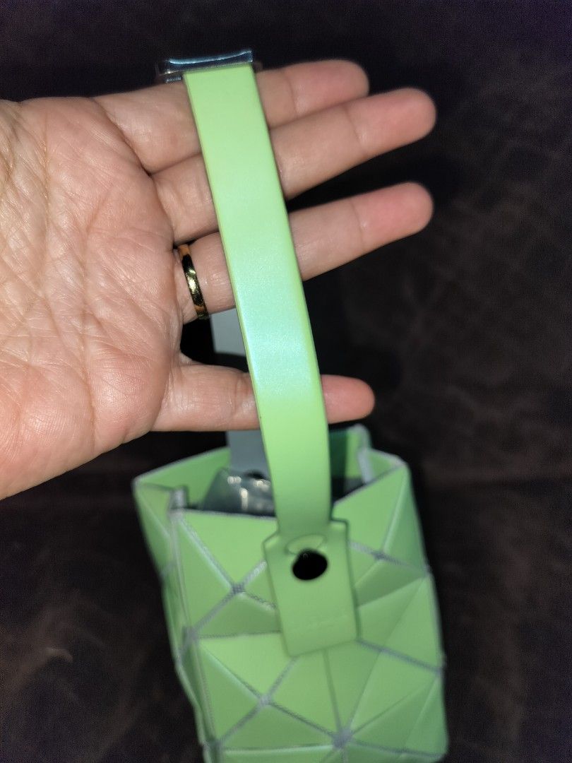AUTHENTIC BAOBAO ISSEY MIYAKE MOBILE BAG (Category: Purses & Pouches) located in Caloocan City. Submitted by jennielz (Listing ID 1462157841, Image 3). Description: authentic Issey Miyake mobile bag -light green -no flaw -good as new -coded -with micro rfid chip -made in Japan.