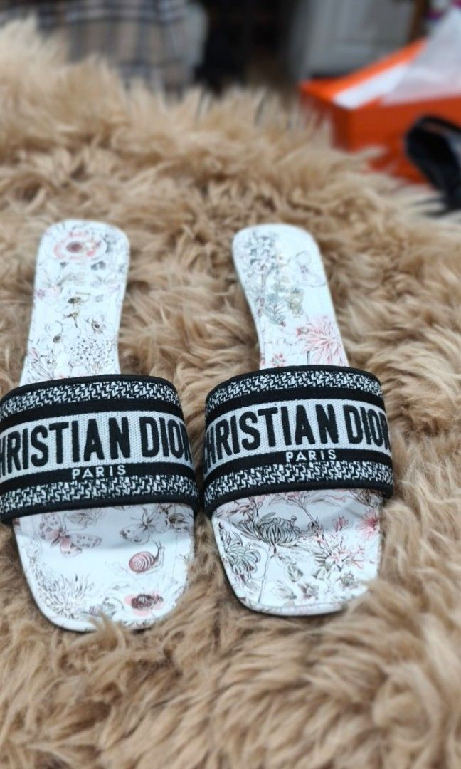 Authentic Christian Dior Sandals (Category: Flats & Sandals) located in La Trinidad. Submitted by designerluxeshop (Listing ID 1462186245, Image 2). Description: Pre-owned Christian Dior Sandals with authenticity document, dustbag and box size 42, 💯% original, in good condition shipping is free, message me if interested, delivery is by schedule discount is offered for cash buyer layaway is accepted 20% downpayment 80% balance payable up to 4-6mo
