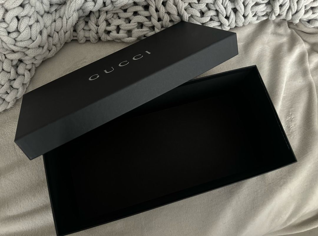 Authentic Gucci Box (Category: Luxury Bags & Wallets) located in San Juan City. Submitted by flipandfind (Listing ID 1462044017, Image 2). Description: - Authentic Gucci box - Black exterior with silver Gucci logo - Black interior - Includes original lid - Ideal for storing small items or as a gift box Box only Authentic No damages.