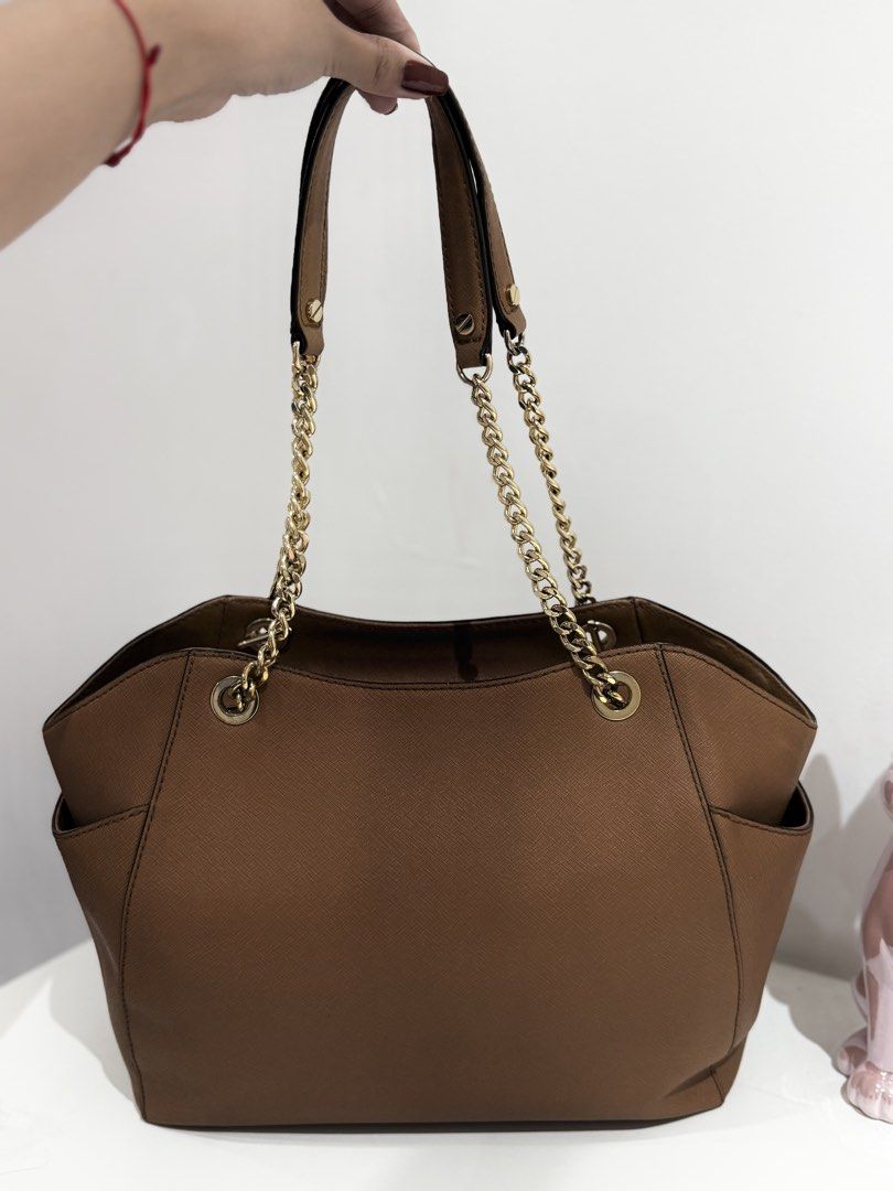 Authentic Michael Kors Tote Bag in Dark Brown (Category: Tote Bags) located in Manila. Submitted by strawberrymelo (Listing ID 1462111873, Image 2). Description: .