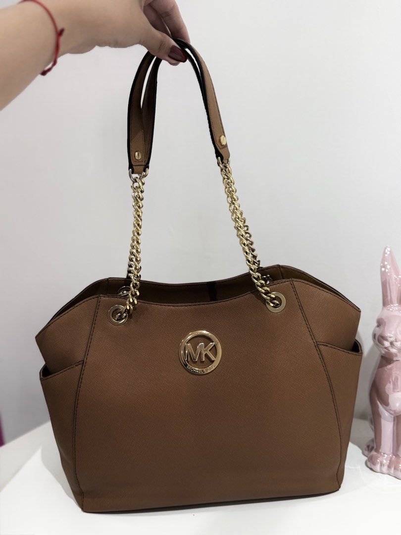 Authentic Michael Kors Tote Bag in Dark Brown (Category: Tote Bags) located in Manila. Submitted by strawberrymelo (Listing ID 1462111873, Image 1). Description: .