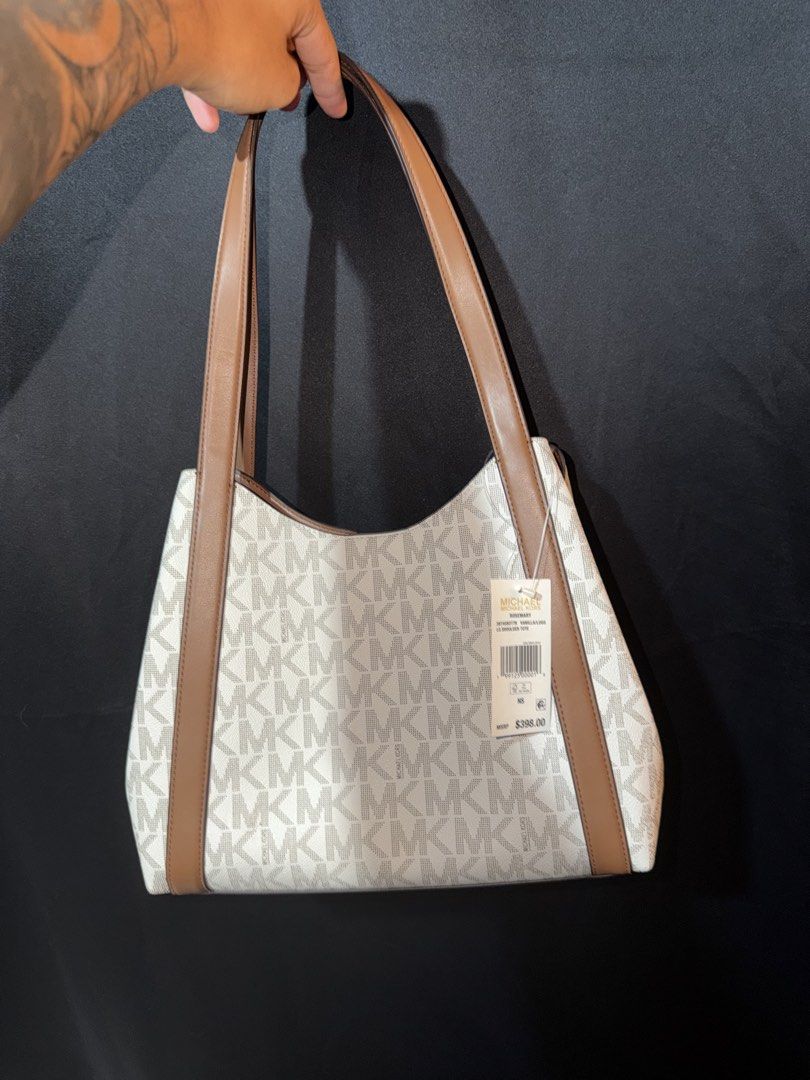 AUTHENTIC MK BAG (Category: Tote Bags) located in Quezon City. Submitted by irldn_ (Listing ID 1462138935, Image 2). Description: - never been used - with tag - no hidden issue - perfect for everyday use.