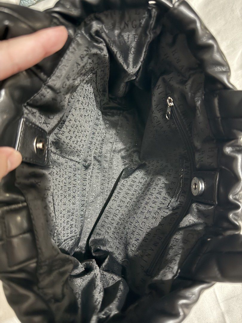 AX Armani Exchange Black Leather Tote Bag (Category: Luxury Bags & Wallets) located in Paranaque City. Submitted by coleencusi96 (Listing ID 1462072140, Image 3). Description: AX Armani Exchange black leather drawstring tote bag Bought in Japan.