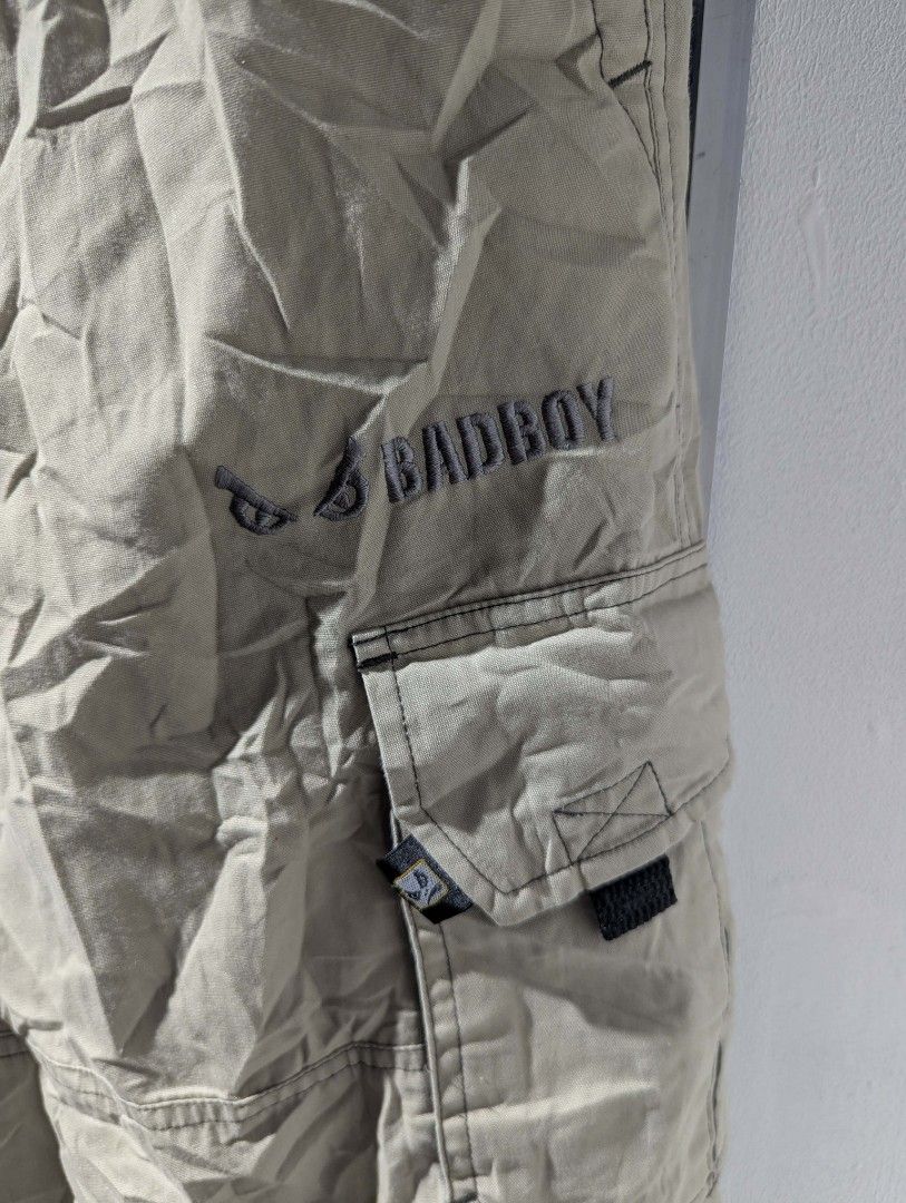 Bad Boy Cargo Pants Size M (Category: Jeans) located in Manila. Submitted by roblesniks33584 (Listing ID 1462052853, Image 2). Description: - Brand: Bad Boy - Color: Khaki - Size: Medium (M) - Style: Cargo Pants - Features: Built-in belt with buckle, elastic waistband with button closure, multiple pockets - Ideal for: Casual wear, outdoor activities.