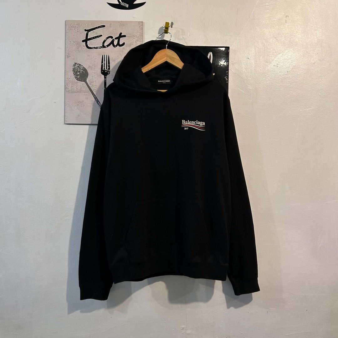 Balenciaga 2017 Logo Hoodie (Category: Activewear) located in Manila. Submitted by jakes_thrift_shop (Listing ID 1462243433, Image 3). Description: - Black Balenciaga hoodie - Features the 2017 logo on the back - Tag size: L - Made in Portugal - Condition: Good.