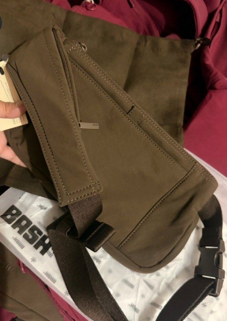 BASH Expedition - Body Bag (Category: Purses & Pouches) located in Quezon City. Submitted by meowhello2123 (Listing ID 1462048421, Image 3). Description: Used Once RFS Bought another color Like new BASH waist bag - Main zippered compartment - Front slip pocket - Adjustable strap with buckle closure - Includes original packaging and tags - 'Made for the world' design.