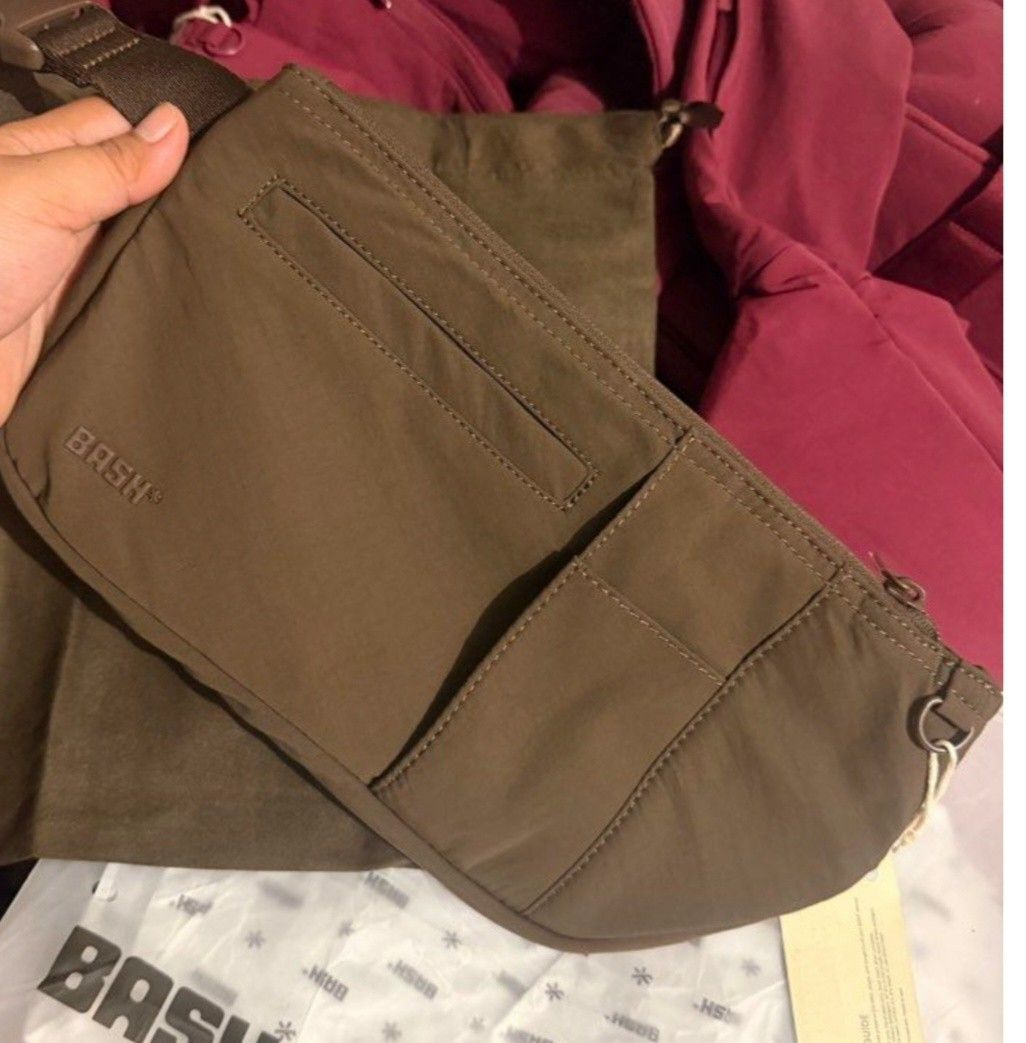 BASH Expedition - Body Bag (Category: Purses & Pouches) located in Quezon City. Submitted by meowhello2123 (Listing ID 1462048421, Image 1). Description: Used Once RFS Bought another color Like new BASH waist bag - Main zippered compartment - Front slip pocket - Adjustable strap with buckle closure - Includes original packaging and tags - 'Made for the world' design.