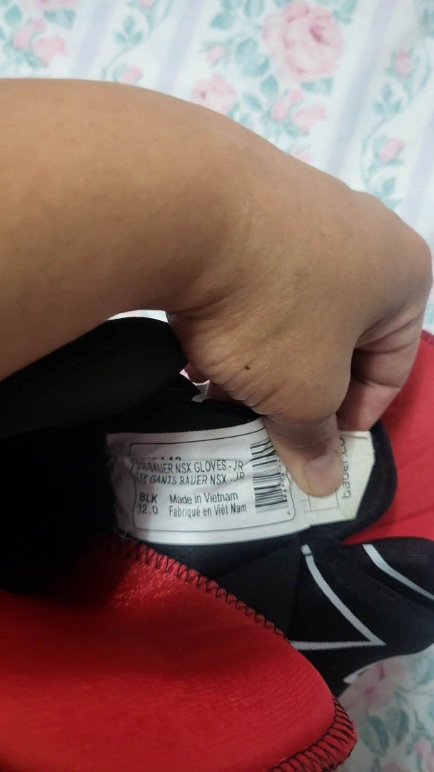 Bauer NSX Junior Hockey Gloves (Category: Other Sports Equipment and Supplies) located in Caloocan City. Submitted by sparkplug21 (Listing ID 1462104340, Image 3). Description: - Bauer NSX junior hockey gloves - Size: 12.0 - Color: Black with red accents - Condition: Left palm shows wear, right glove is cleaner - Ideal for young hockey players - Made in Vietnam.