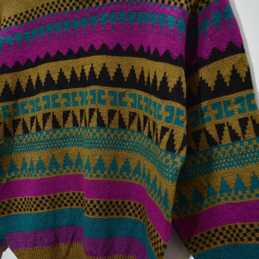 Be More Vintage Geometric Pattern Mock Neck Sweater Preloved (Category: Coats, Jackets and Outerwear) located in Polomolok. Submitted by lastthrift (Listing ID 1462202894, Image 3). Description: - Vintage Be More sweater - Unique geometric pattern in purple, teal, and black - Base color: warm brown/khaki - Mock neck style - Minor flaw: small hole on left sleeve near shoulder (visible in last photo) - Otherwise a unique and stylish piece - 20x23".