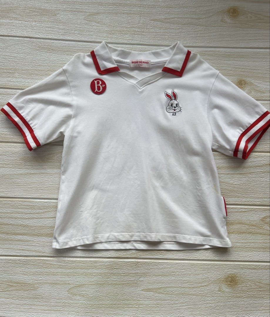 Bebe de Pino short-sleeved top (Category: Babies & Kids Fashion) located in Cebu City. Submitted by yjainani (Listing ID 1462091544, Image 2). Description: Bebe de Pino short-sleeved top featuring a cute rabbit character as a highlight. The top is a clean white with eye-catching red accents ( flaw seen in the pic yellow discoloration ) fits 4 years old.