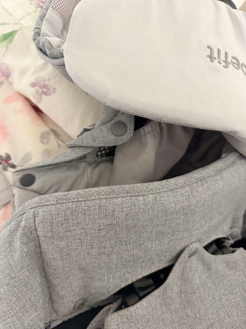 BebeFit Baby Carrier (Category: Carriers & Slings) located in Cebu City. Submitted by cutexoxoshop (Listing ID 1462053337, Image 3). Description: - BebeFit Grey & White Baby Carrier - Multiple carrying positions for versatility - Padded straps for maximum comfort - Secure snap button closures - Allows for hands-free carrying.