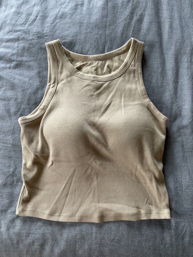 Beige Tank Top (Category: Sleeveless) located in Makati City. Submitted by _scloset (Listing ID 1462064549, Image 1). Description: Beige tank top with built-in pads Unbranded but good quality Fits size Small Shipping c/o buyer.