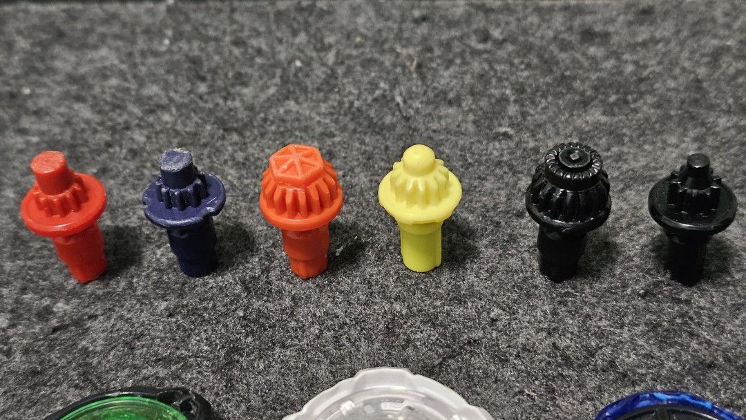 Beyblade X Parts (Category: Action & Battle Toys) located in Manila. Submitted by greycrane (Listing ID 1462168172, Image 2). Description: Beyblade X Parts Bits - sold as set only 800 Rush - 6/10 with chip Low Rush - 5/10 well-used Hexa - 7/10 Free Ball - 8.5/10 Level - 8/10 Wedge - 8/10 Ratchets - sold as set only for 800 1-60 - 8/10 1-70 - 8/10 3-60 - 8/10 5-60 - 7.5/10 9-60 - 7/10 TT Wizard Rod 35.68g 7/10 for 600 TT Shark Scale 37.58g 7/10 fo