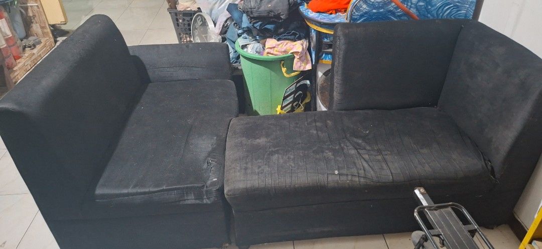 Black 2-Seater Sofa (Category: Sofas) located in Valenzuela. Submitted by thriftlets (Listing ID 1462123905, Image 1). Description: - Black two-seater sofa - Fabric shows some wear, particularly on seat cushions - Still functional and comfortable - Pick up only or via lalamove.