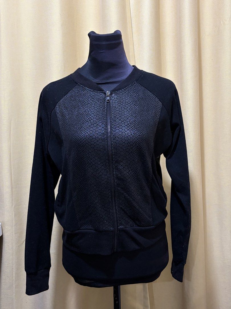 Black Bomber Jacket with Textured Front Panel (Category: Coats, Jackets and Outerwear) located in Baguio. Submitted by fionabanana (Listing ID 1462114348, Image 1). Description: - Classic black bomber jacket - Zipper front closure - Textured panel on chest - Ribbed cuffs and hem - Long sleeves - Ideal for layering.